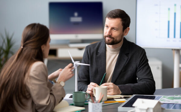 Salaried professionals discussing loan approval – loan against salary in Bangalore