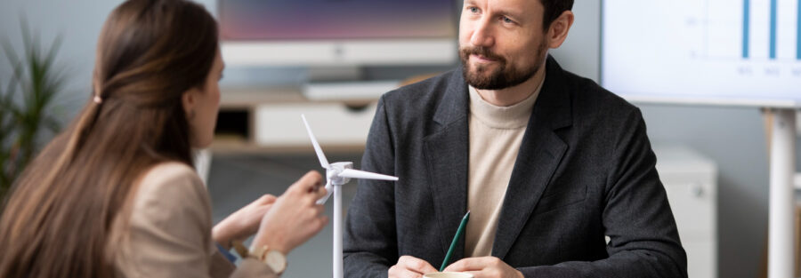 Salaried professionals discussing loan approval – loan against salary in Bangalore